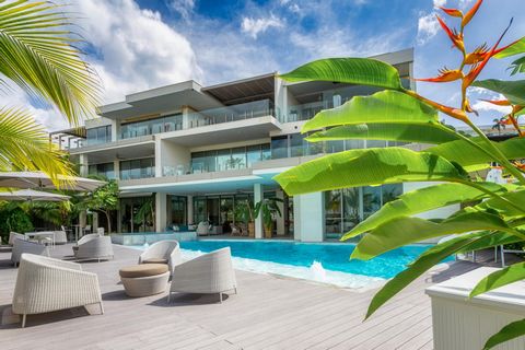 Illuminated by the endless shimmer of the sun, Summer House stands radiant on the waterfront where the ocean meets the islands at the bay, in the heart of the glittering lights of Panama City, Panama. More than just a home, Summer House provides a ga...