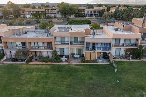 Experience breathtaking views of the Sandia Mountains, Rio Grande River, and the city of Albuquerque from this stunning home located in the gated community of The Westcliff Townhomes. The main level includes a dining area, a kitchen with appliances, ...