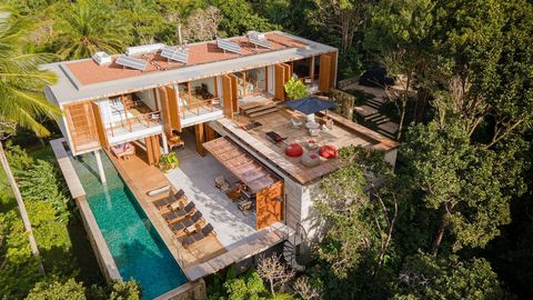 This exceptional property is a harmonious blend of contemporary architecture and the lush Atlantic Forest on one side, with captivating views of the open sea on the other. The Villa is thoughtfully designed across three levels, seamlessly integrating...