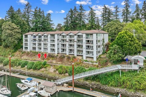  Willamette River Front Condo with Double Balconies to Enjoy the View. Ground level, accessible. Best possible view of the river in the complex, about as close as you can get. Two garage spots and lots of additional storage as well. Two luxurious bed...