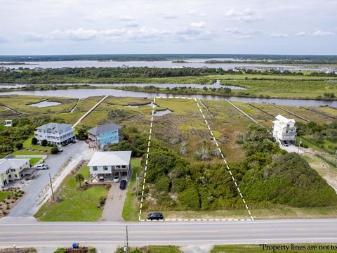 Prime 1.76-Acre Lot with Stunning Marsh Views & Beach Access Across the Street! Discover the perfect location for your dream beach getaway or permanent residence on this spacious 1.76-acre second-row lot in North Topsail Island. Ideally situated dire...