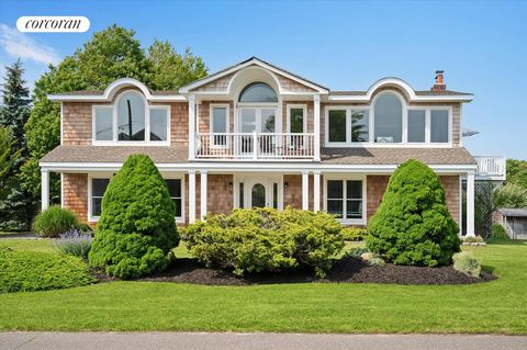 Welcome to 23 Sedgemere Road, Center Moriches. A well-planned major renovation in 2016 transformed this cedar-shake four-bedroom, two Bathroom home into a spectacular coastal retreat with sweeping panoramic views from Areskonk Creek to the open water...