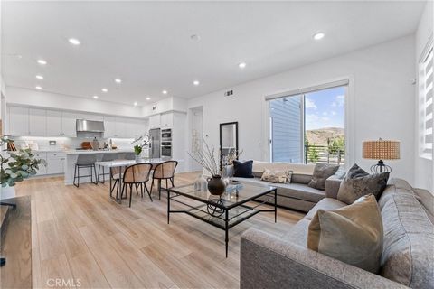 Discover refined living in this beautifully upgraded 2-bedroom, 2-bathroom condo located in the vibrant Solis Park community of Great Park. Situated on the second floor of a secure, gated-access building with 24-hour security, this single-level home ...