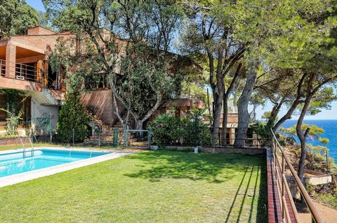 Wonderful waterfront villa in the sought after Cala Sant Francesc, Blanes, Costa Brava, Spain. The three-storey Mediterranean-style villa is located directly on the rocky and picturesque shore of the Costa Brava in the prestigious area of Blanes in S...