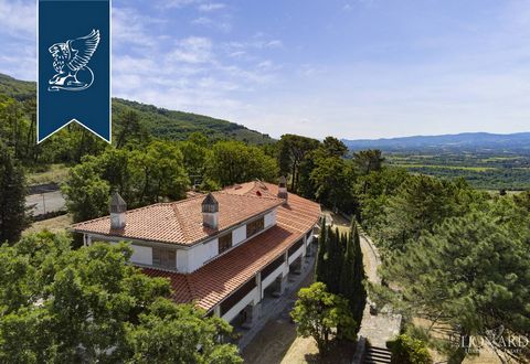 Immersed in the green countryside of Arezzo, in the town of Loro Ciuffenna in the province of Arezzo, this luxury property is for sale. The property consists of a main villa and an outbuilding which have a total area of 1150 m2. On the ground floor o...