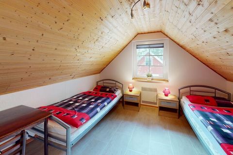 Do you like nature, peace and independence? Then this holiday home with sauna and fireplace in Scandinavian style is right for you. In the small, car-free and family-friendly holiday village in an idyllic location, directly on Lake Userin, you can qu...