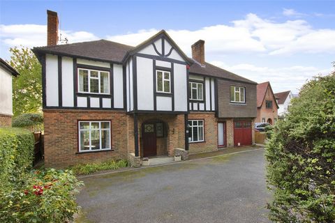 GUIDE PRICE £1,000,000 - £1,200,000 This attractive circa 1930s mock Tudor property was extended and reconfigured by the current family to give the original four bedroom house the additional bedroom in an adjoining self-contained annex making it five...