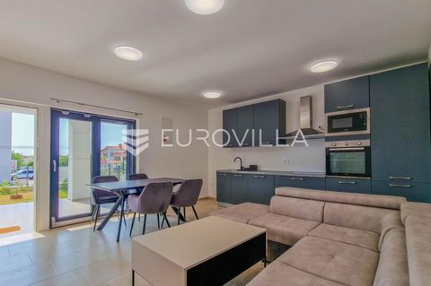 An apartment on the ground floor of a residential building is for sale just 500 m from the sea and a beautifully landscaped beach and 1000 m from the city center. The apartment is 98 m2 and consists of a hallway, two bathrooms, two bedrooms, a kitche...