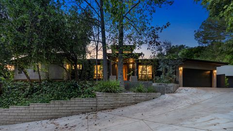 Serenity awaits in this stunning contemporary home nestled in a highly desired pocket of Bel Air. Enjoy a spacious open floor plan that has been completely updated throughout. High ceilings make the space feel light and airy, while large windows floo...