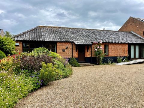 *** NO ONWARD CHAIN ***Embrace country life with easy access to amenities and enjoy making your home in this attractive and well-designed conversion. Vaulted ceilings and original timbers showcase the scale and heritage of the barn, while the semi-op...