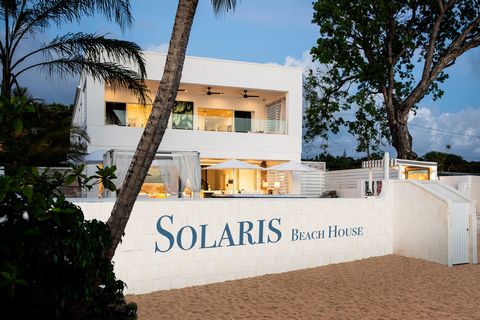 Located in Lower Carlton. Introducing Solaris Beach House, a newly available gem. This exquisite, cutting-edge five-bedroom residence boasts 6 bathrooms and features two bedrooms with walk-in wardrobes and breathtaking sea views. Nestled on approxima...