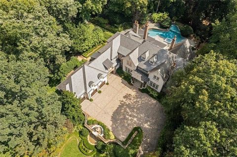 Spectacular estate on 2.36 fenced acres on 2 separate deeded lots with a main gate and side gate to the property on a series of cul de sac streets in Buckhead. Perfect for walking with no cut through traffic. Separate monitored security for the neigh...