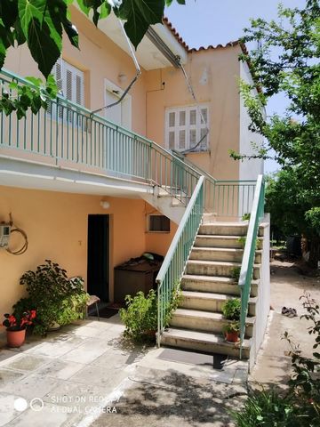 House for sale in Aigio, Kouloura. Two-storey house of 117 sq.m., with independent apartments on the ground floor - 1st floor on the plot of 800 sq.m. Each apartment has living room, kitchen 1 bedroom and 1 bath.  There is the possibility of combinin...