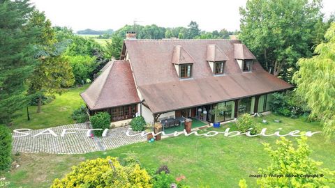 Propriété de 10 pièces, 5 chambres, 2 vérandas, piscine d'intérieure, terrain clos de 3500m2.