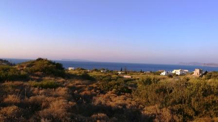 Trypitos -Sitia: Plot of land of 31.200m2 located 750 meters from the sea. The plot has a building right 500m2 and the water and electricity are nearby. It has good access and enjoys views to sea and mountains.