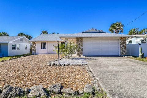 Welcome home to your own private Oasis! Kick off your shoes and take in the relaxing views of the Saltwater canal, 2 story dock & sparkling inground swimming pool right from your enclosed Florida room! You will enjoy cooking in the updated kitchen wi...
