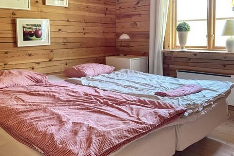 A warm welcome to Gråbo and this cozy cabin with a unique and private location in the beautiful Småland forests. A lovely log cabin with beautiful details both inside and out. The cottage is located at the end of a private road, so you can really enj...