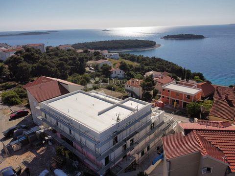 This beautiful apartment on the first floor of a modern residential building in Primošten offers a comfortable and luxurious living space. With a total net living area of 68.7m2, the space is cleverly arranged to maximize every corner. The entrance a...