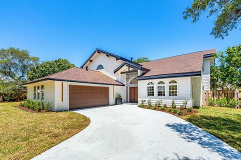 Introducing Hummingbird Haven, nestled in The Sanctuary located in Indialantic, Florida. This beautifully 2024 renovated home offers five bedrooms and three bathrooms, with the option to convert one bedroom into a large office with a double door entr...