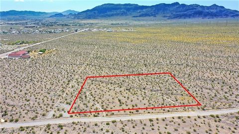 Land for sale in peaceful Pahrump. Quiet neighborhood on the east side of town. 15 mins from the center of town and near BLM Land. This large 2.50 acre property is a corner lot which allows easy access to and from town. Gorgeous mountain views and th...