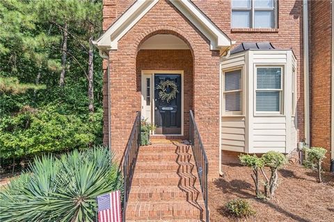 Look no further! Welcome Home to 2530 Holcomb Springs Dr. Nestled at the end of a quiet cul-de-sac, this private end-unit townhome is the nicest spot in the neighborhood! An end-unit townhome means more windows, more yard space, AND this one backs up...