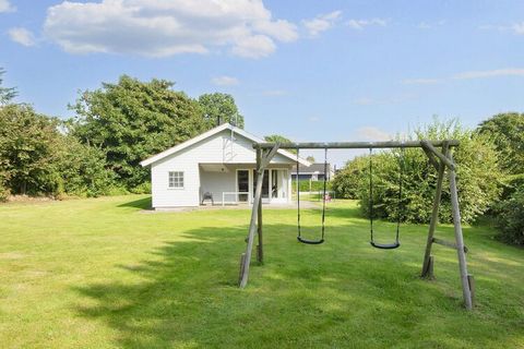 Holiday home located in scenic surroundings only about 300 meters from a lovely, child-friendly sandy beach at Rude Strand. The kitchen is in open connection with the living room, so here everyone can have fun and play games or cook. The cottage has ...