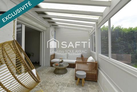 Maison 129m² avec garage et jardin.