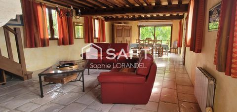 Maison spacieuse, terrain arboré.