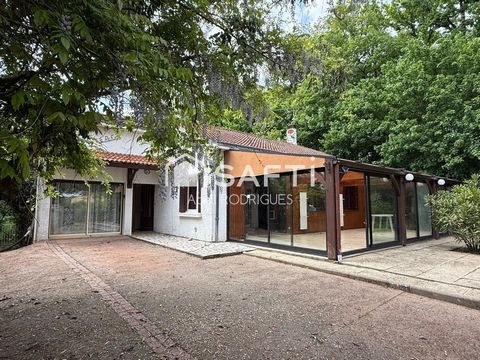 Maison au coeur d'un environnement verdoyant