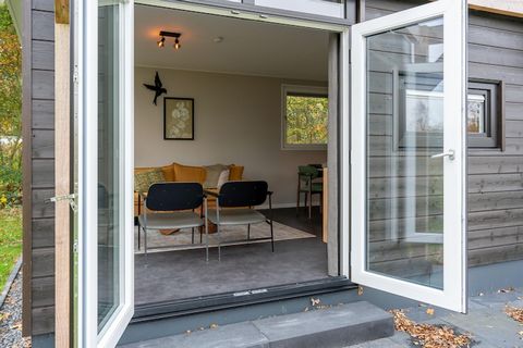 This brand-new holiday home offers a perfect retreat in the heart of Friesland, surrounded by both water and forest. Located on a beautiful Frisian estate, it provides a peaceful setting for a relaxing getaway. The modern, luxurious kitchen is fully ...