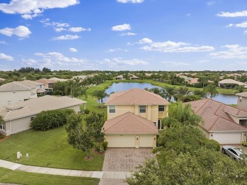 Lakefront, Expansive 5BR 3BA 3CG Home on a large Lot Meticulously Maintained! This home features NEW IMPACT windows and doors with a lifetime warranty, tile and laminate floors, an upgraded staircase and light fixtures, and seamless gutters. The brig...