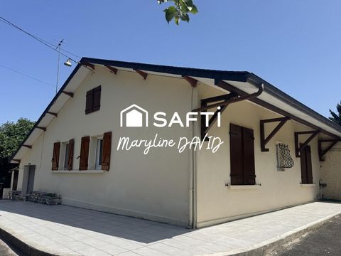 Maison de plain-pied de 100m², jardin et garages