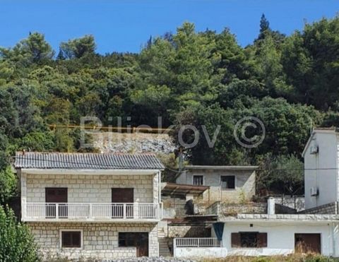 Brač, Povlja detached house of approx. 93 m2 on two floors on a plot of 446 m2. In addition to the main house, there are three additional buildings on the plot, with a total net area of 159 m2. The main house consists of two floors, ground floor and ...