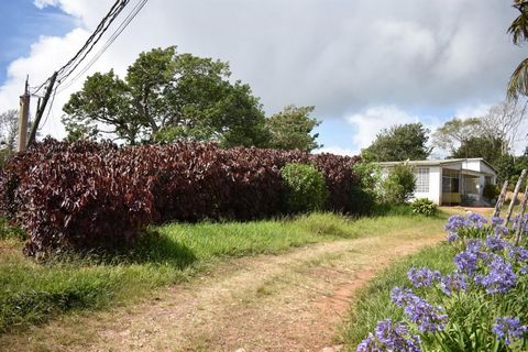 This flat and little over 1 acre of land with a much older home is now available. Very central and close proximity to the Spur Tree main Road. This property is very suitable for residential or agricultural development.