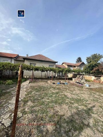 'Address' Real Estate offers a house with a large yard in the town of Pordim. Large yard of 2 acres and a spacious house with 130 sq.m. built-up area. Consists of: Two bedrooms, living room, kitchen, bathroom with toilet. Tavern - a place for your fa...