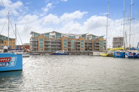 PROPERTY SUMMARY The Quarterdeck is a landmark, water fronting building which was built in 2001. The current owners acquired both apartments 13 & 14 converting them to form one large dwelling in 2015, by joining them together they created a substanti...