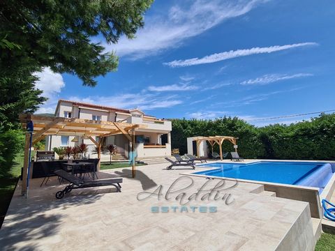 Exclusive holiday villa in Kastel Stafilic, a true Mediterranean hacienda with plenty of garden space. It rises on two floors with 282.41 square meters of living space, of high quality and solid construction, lavishly equipped and lavishly furnished....
