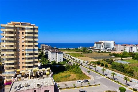 Appartement in Mahmutlar gebied op slechts 350 meter met een totale oppervlakte van 130 m2 Een appartement op de 8e verdieping in de wijk Mahmutlar met prachtig uitzicht op zee en een totale oppervlakte van 130 vierkante meter, uitgerust met drie rui...