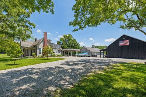 Price Improvement! Williamson County Historically renovated 125 year old farmhouse 5 minutes to 840 and only 25 minutes to downtown Franklin. Situated on 16.5 acres, the home exudes historic charm while offering modern amenities. The current homeowne...