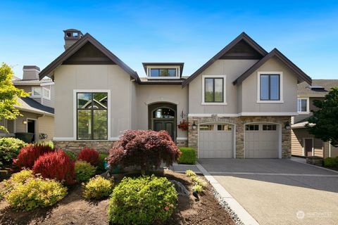 Experience unparalleled luxury in the desirable Edgemoor community of Sammamish with this 5,800 sq ft custom-built home. Designed by a homebuilder executive, this home offers meticulous craftsmanship and unobstructed views of Lake Sammamish, Seattle ...