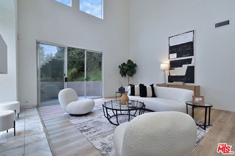 Located in prestigious Beverly Hills 90210, awaits this 4 bedroom/5 bathroom multi-level home with its own elevator. This is a rare offering with timeless quality at an attractive price point. The home is drenched with an abundance of natural light w...