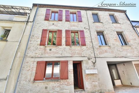 Immeuble en pierre au centre de Villeneuve-sur-Lot (47)