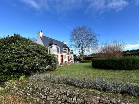 Maison familiale avec jardin paysager, 4 chambres, bureau et sous-sol complet