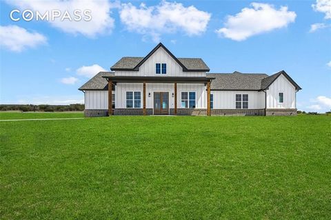 Welcome to this stunning MK Custom Home in the beautiful new Azle Community of Calhoun Acres. As you step inside you'll be greeted by an abundance of natural light that fills the open floorplan. The living room showcases a cathedral ceiling adorned w...