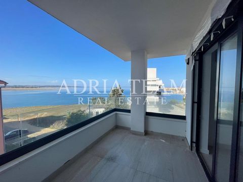 APARTMENT for sale in a newly constructed building, Povljana - Pag. EXCELLENT POSITION! 50 m FROM THE SEA! The building has a total of 9 apartments, three per floor. PROPERTY DESCRIPTION: S7 - 3 bedrooms, living room, kitchen, dining room, 2 bathroom...