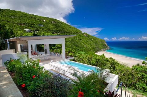 Coldwell Banker Real Estate BVI is excited to present for sale an outstanding contemporary home within a few feet of one of Tortola's most stunning beaches at Trunk Bay on the North Shore of Tortola. Ventana sits upon 1.56 acres of prime beachfront p...