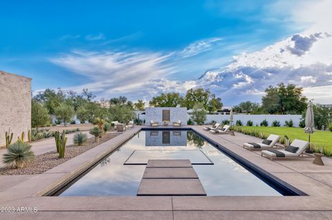 Nestled at the end of a tranquil cul-de-sac, this architectural gem offers a wonderful view of CAMELBACK MTN. Acclaimed architect Susan Biegner crafted a residence that defines luxurious yet comfortable living. Elegant Steel windows + doors thru-out ...