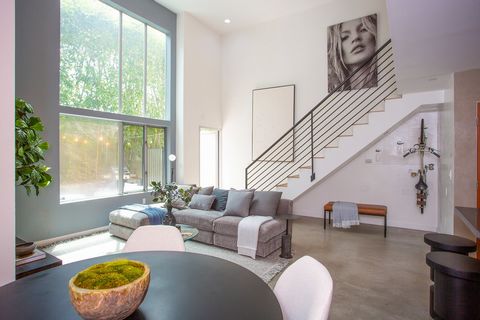 Experience the perfect blend of style, comfort, and sophistication in this exceptional modern loft-style townhouse, where every element is designed with thoughtful precision to create an unparalleled living experience. As you step inside, you're gree...