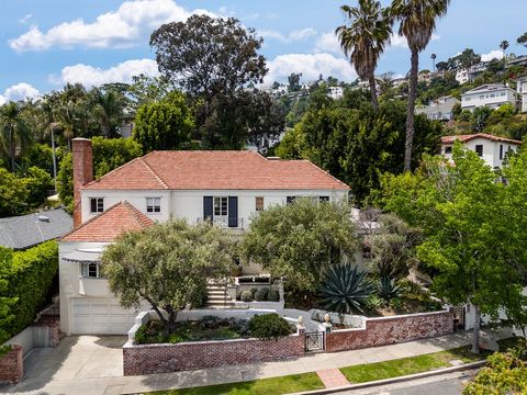 Perfectly situated above the charming streets of prestigious Los Feliz, in the coveted North-of-Boulevard district, this timeless five-bedroom residence traces its origins back to the late 1930s, evoking the allure and glamour of this classic period....