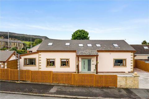 A magnificent Detached property benefitting from fabulous views to the front towards Pendle Hill that has been significantly extended and beautifully modernised to create the most wonderful accommodation that will appeal to up and downsizers alike. O...